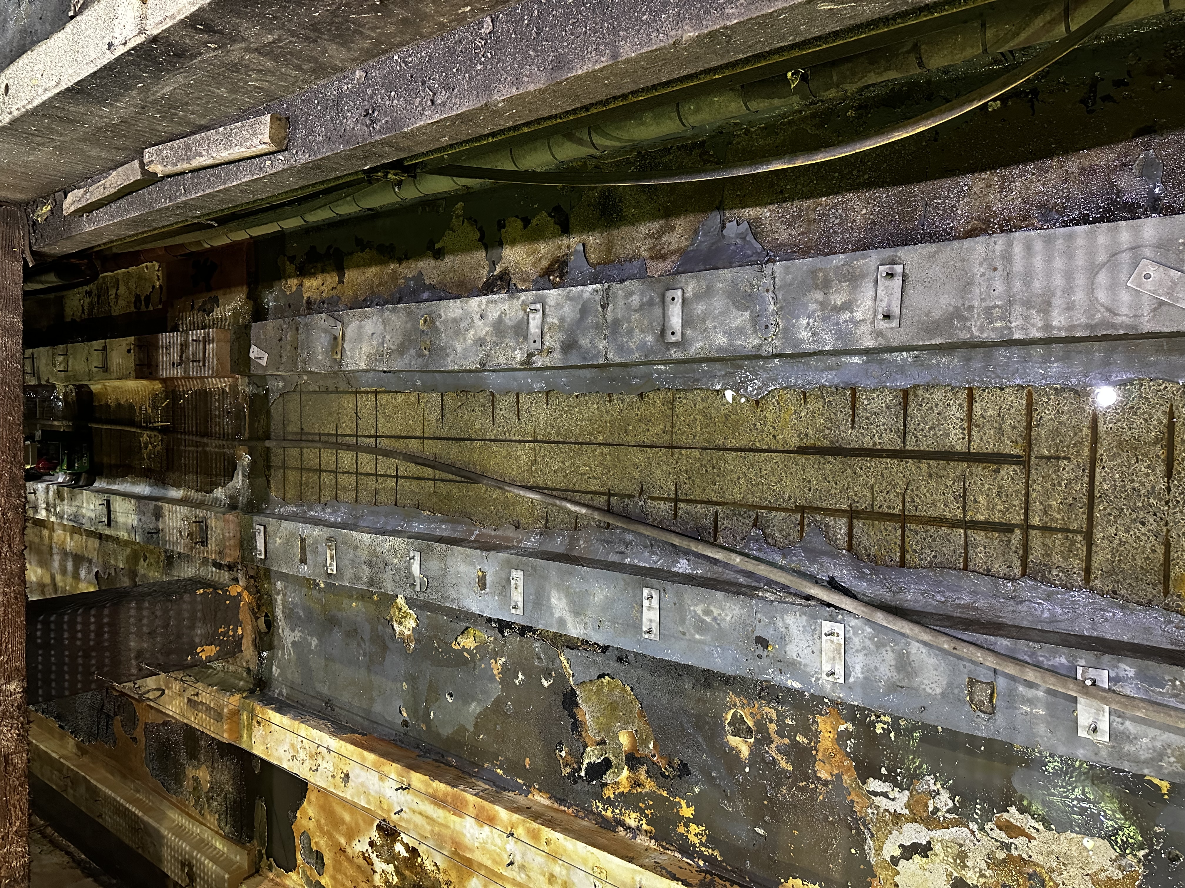 Fire hose wash-down of car well prior to restoration work